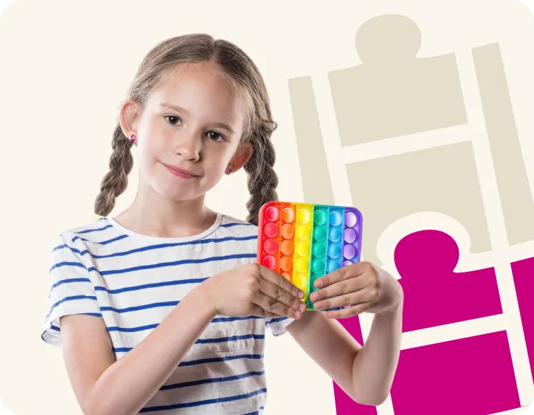 Little girl holding a colorful fidget pop-it toy