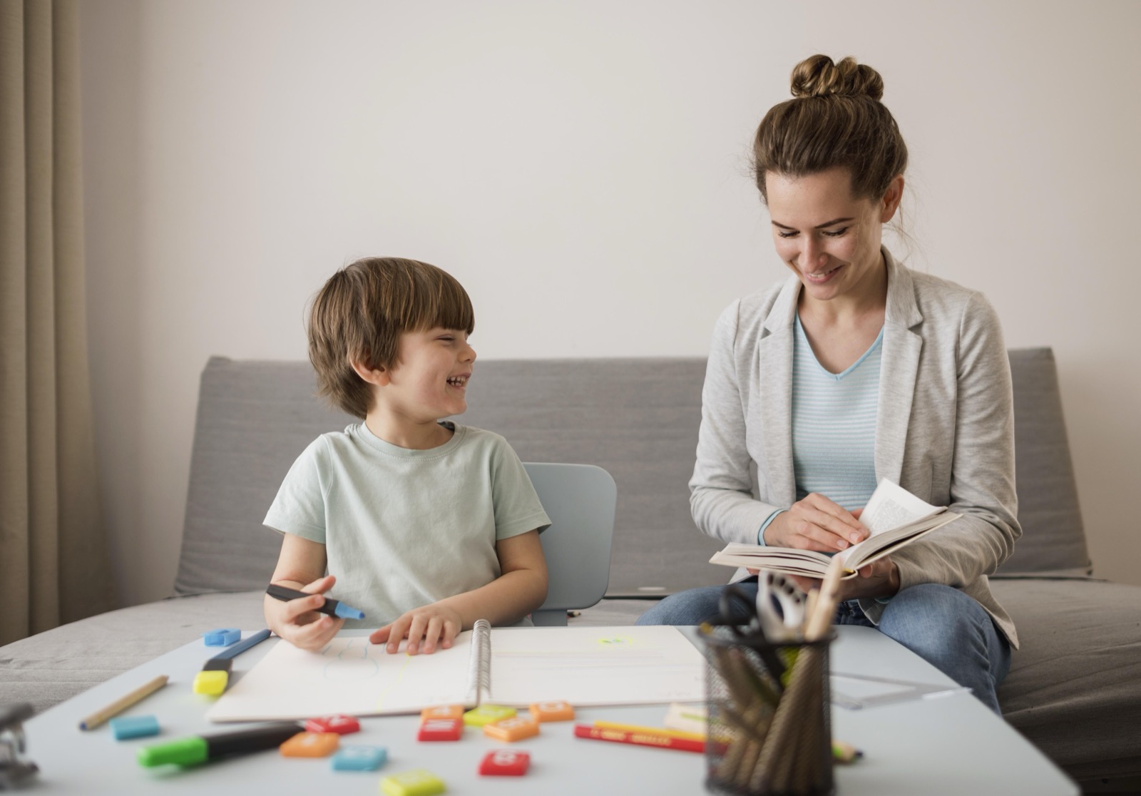 A child being tutored at home