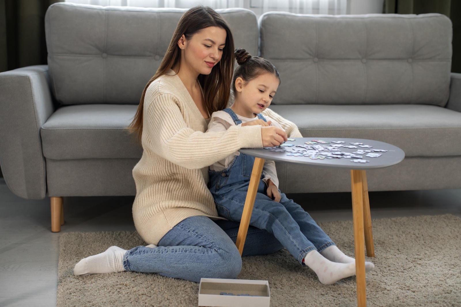 A mother and daughter playing a game together