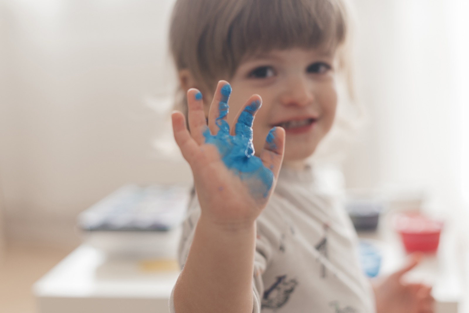 A child painting like an artist