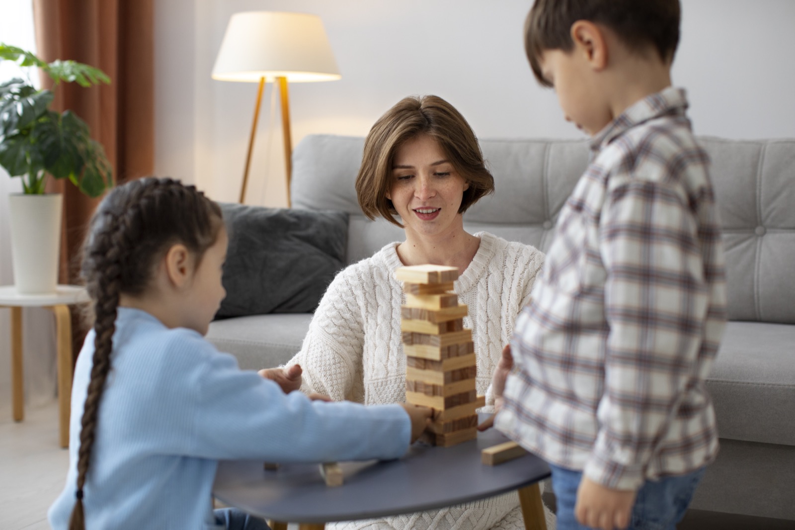 A mother playing with her children