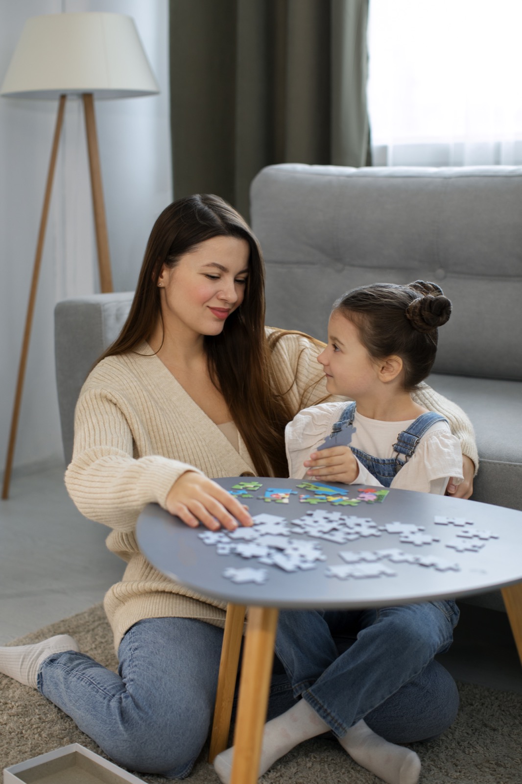 A mother and daughter playing a game together