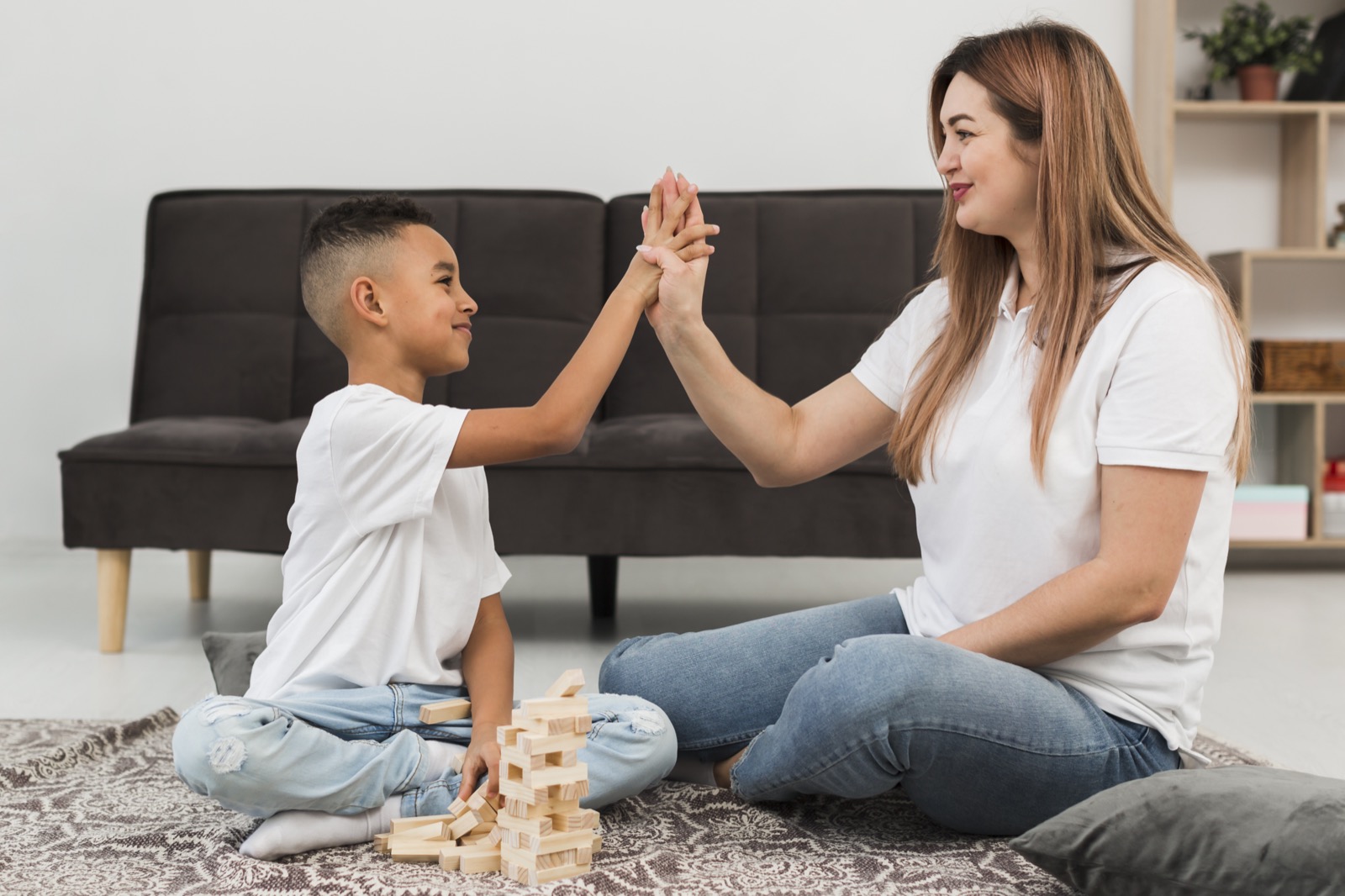 A mother and son spending time together indoors