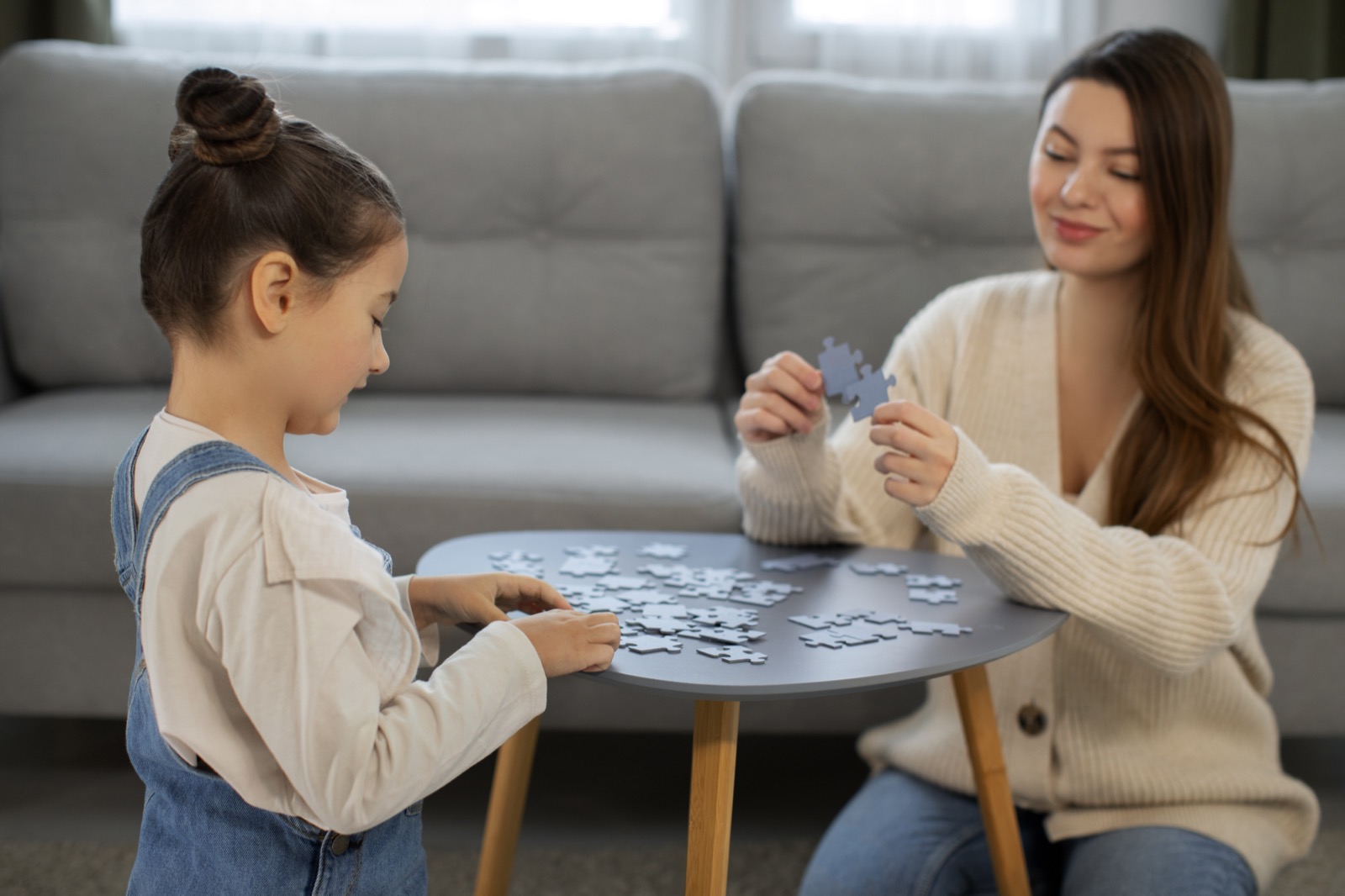 A mother and daughter playing a game together