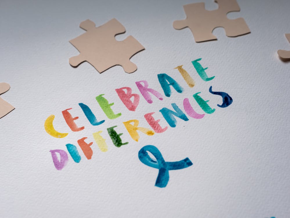 Free Celebrate Differences on White Paper  Stock Photo