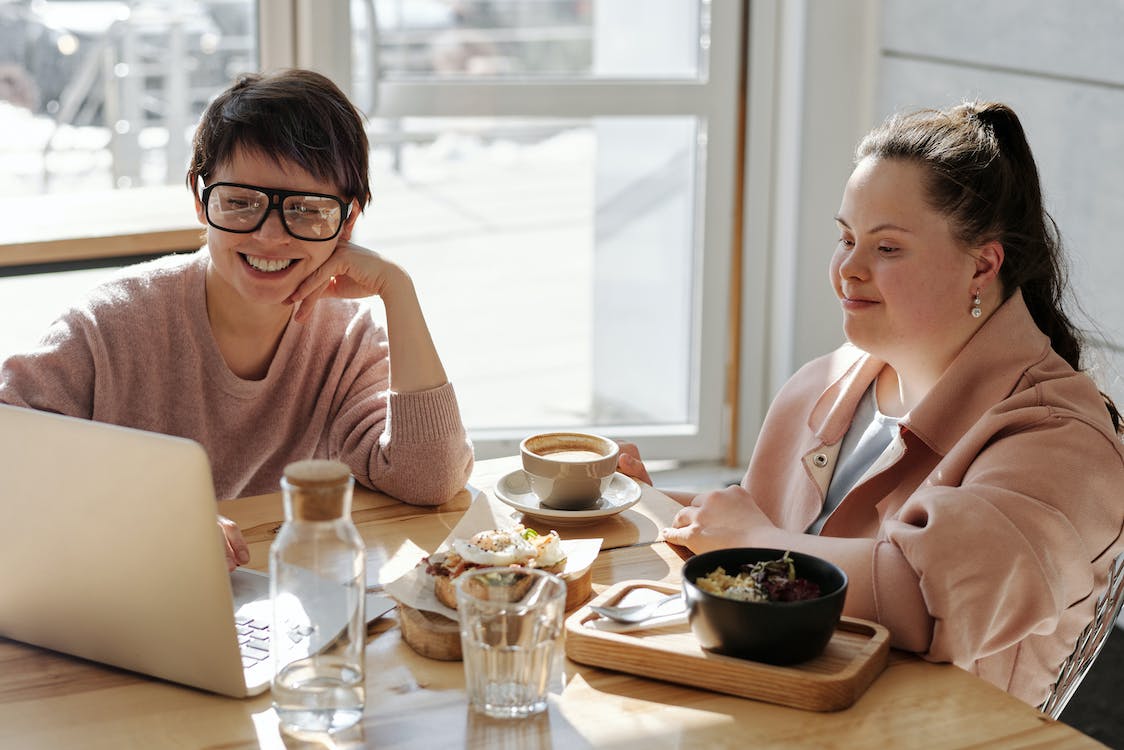 Free Happy Young People Watching On A Laptop Stock Photo