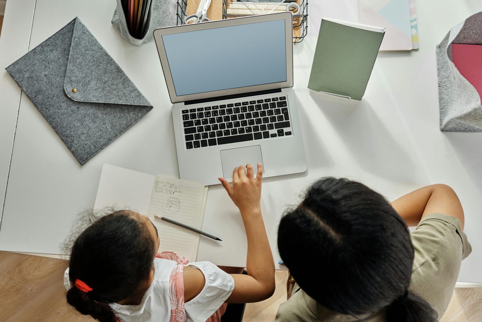 Free Mother Helping her Daughter with Homework Stock Photo