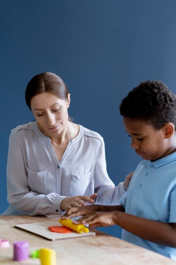 673f23288fd7ebbcd93cf80b kid doing occupational therapy session with psychologist 23 2149091547 jpeg