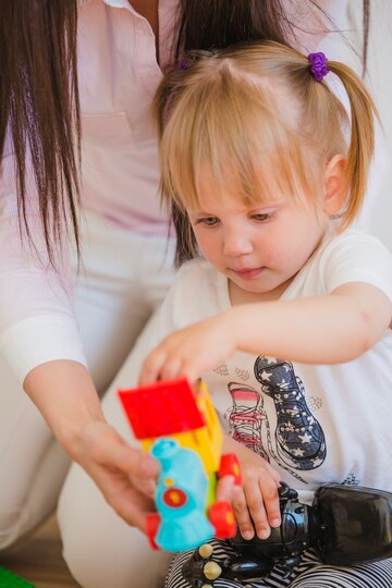 69930bc84474e7062a4876d4 66a1e25a597c9b4ac18b39da woman playing with little blonde girl 23 2147664271 jpeg